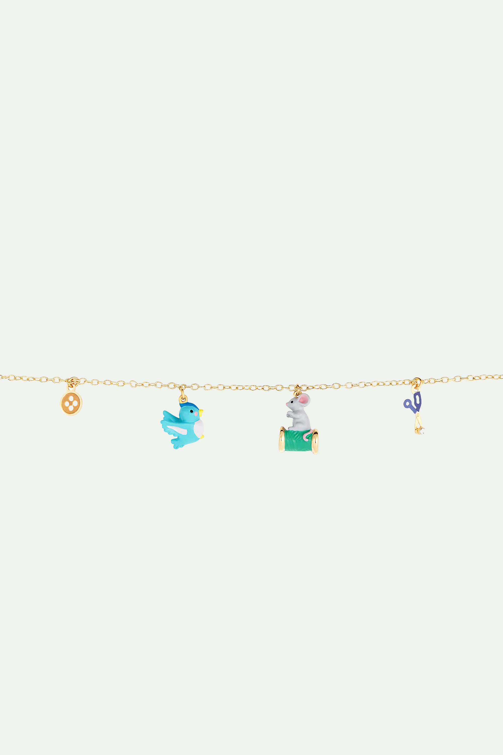 Bracelet fin bouton, oiseau, bobine de fil et souris, ciseau - Image 3